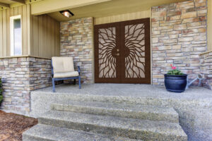 House entrance porch with stone wall trim