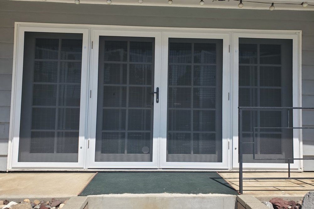 How Security Screens Add Protection to Homes With Private Backyard Access